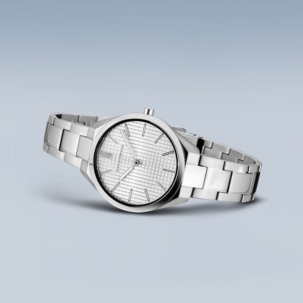 Ladies Ultra Slim Stainless Steel w/ Silver Waffle Sunray Dial and Stainless Steel Strap