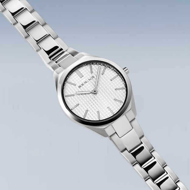 Ladies Ultra Slim Stainless Steel w/ Silver Waffle Sunray Dial and Stainless Steel Strap