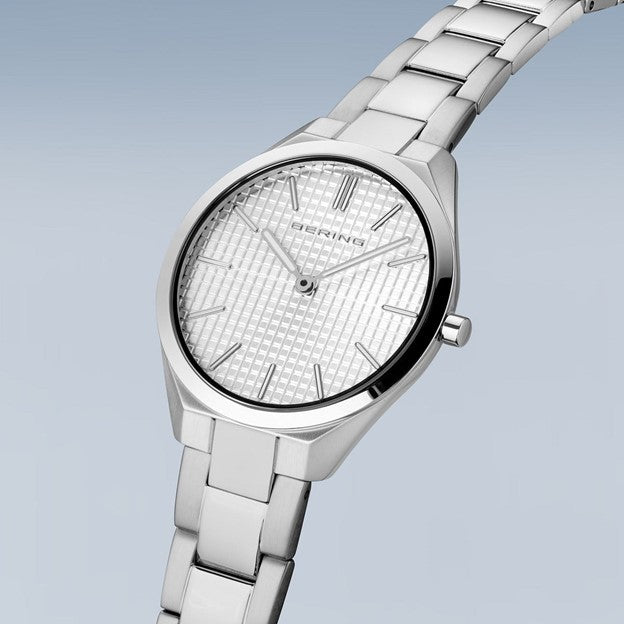 Ladies Ultra Slim Stainless Steel w/ Silver Waffle Sunray Dial and Stainless Steel Strap