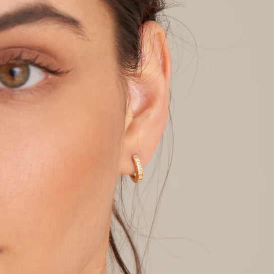 Glam Huggie Hoop Earrings in Gold