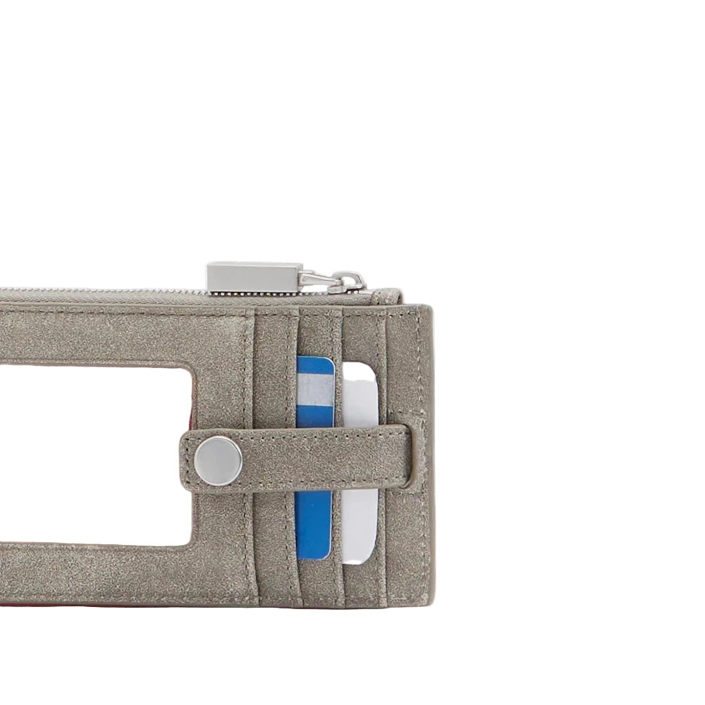 Close-up of a beige wallet with card slots and a zipper on a white background