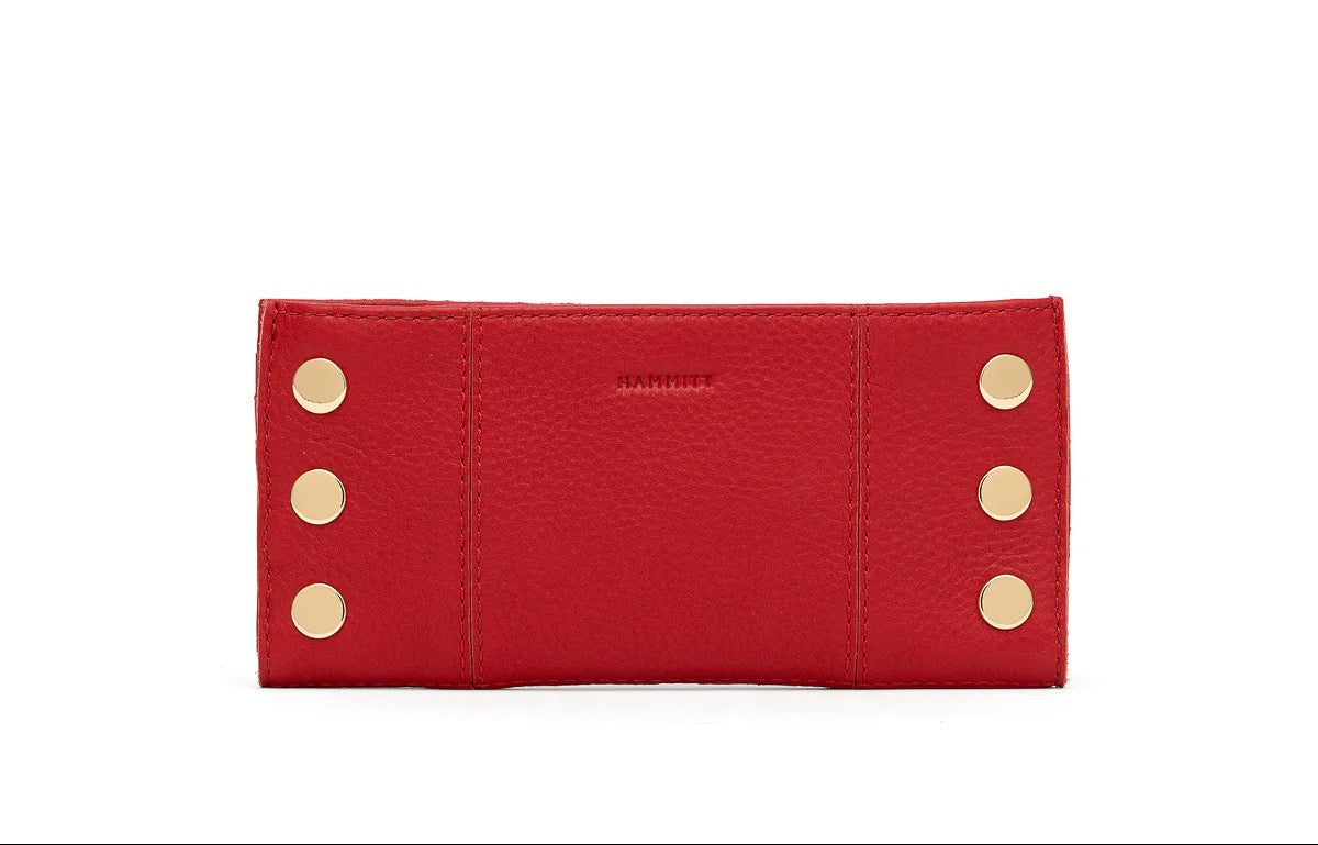 Red wallet with gold buttons on a white background