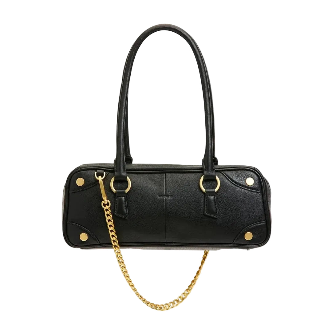 Black handbag with gold chain and hardware on a white background