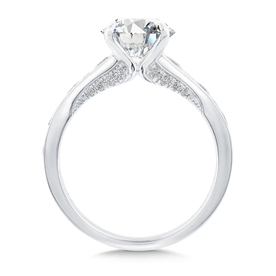 Round Center Engagement Ring with Round and Baguette Channel Accents