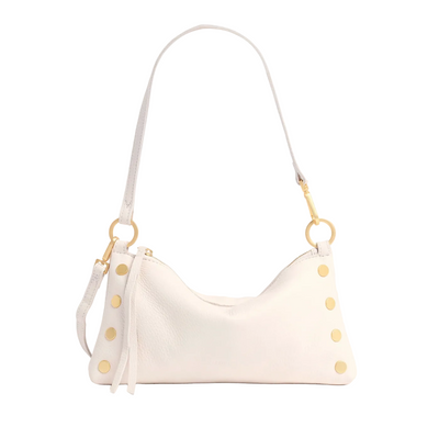 White handbag with gold accents on a white background