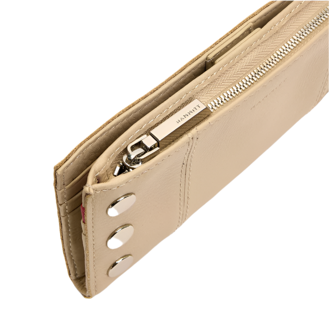 Beige wallet with metallic accents on a white background