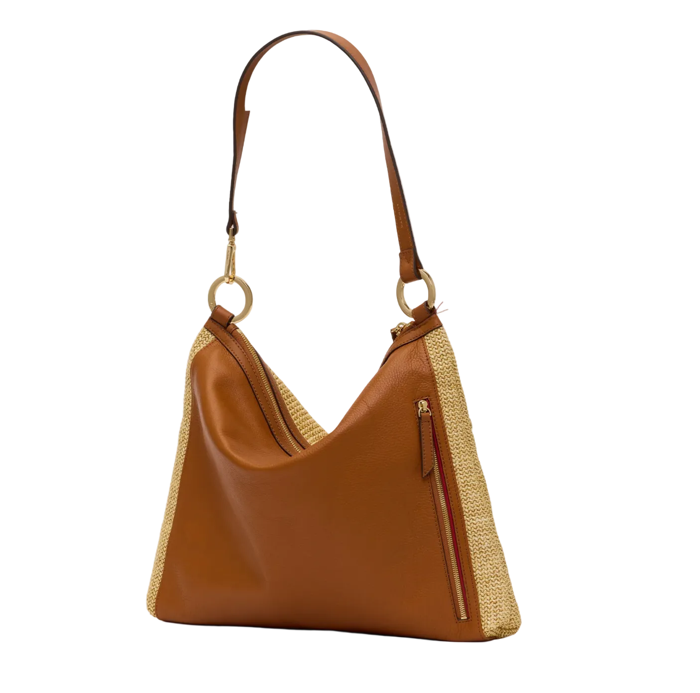 Brown leather handbag with straw accents on a white background
