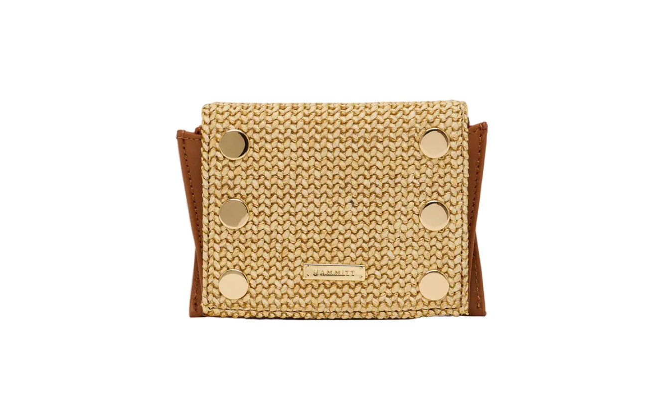 Textured wallet with grommet details on a white background