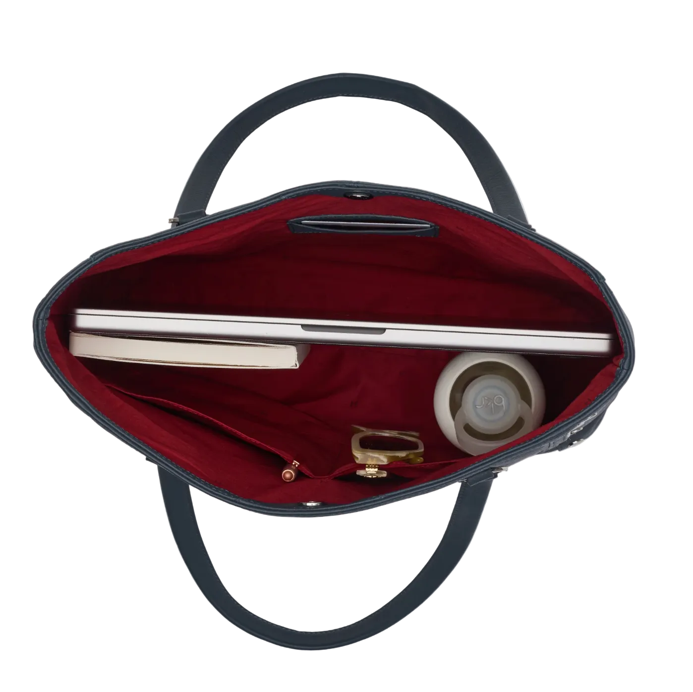 Open handbag with laptop and items on a white background