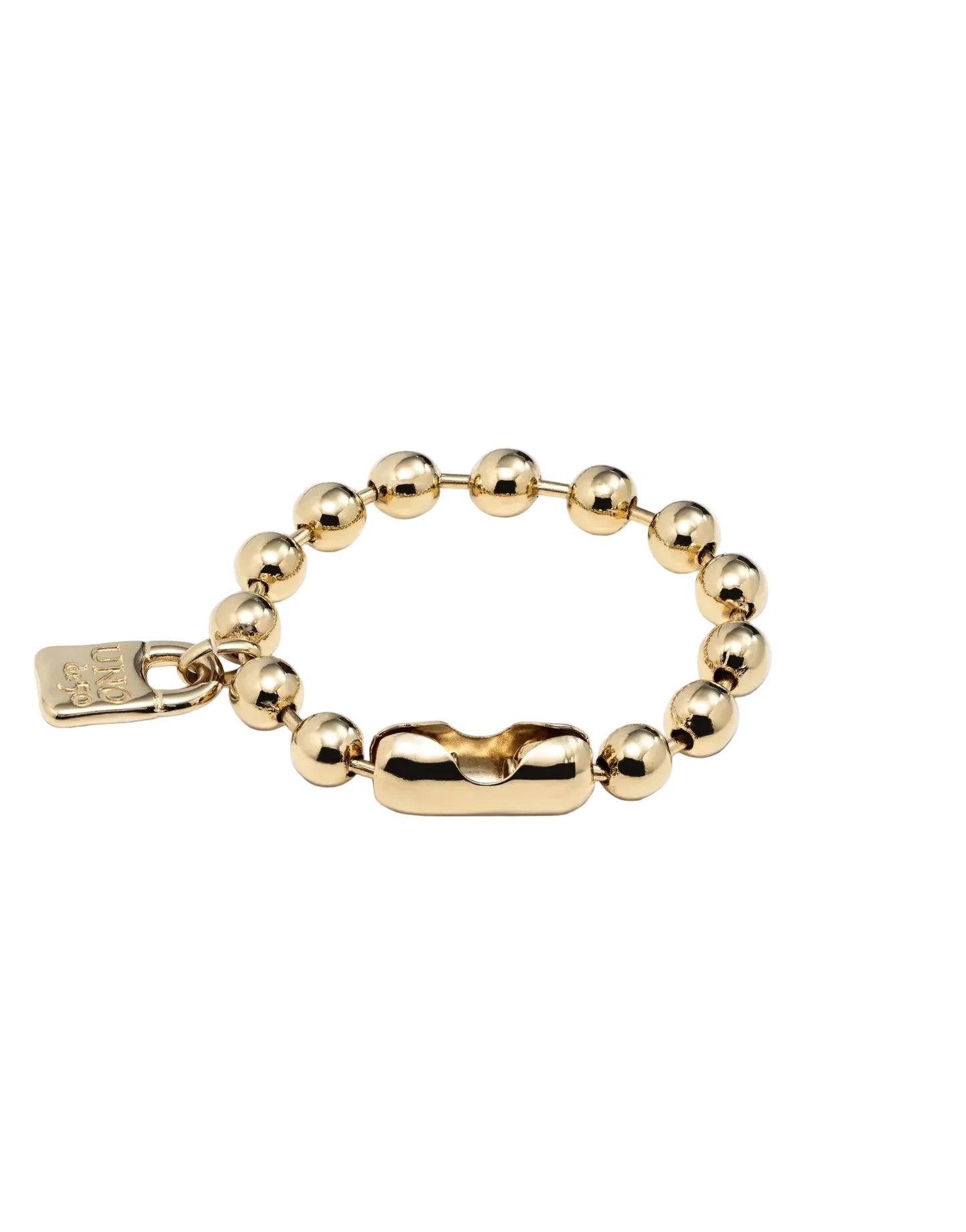 Gold beaded bracelet with a lock charm on a white background
