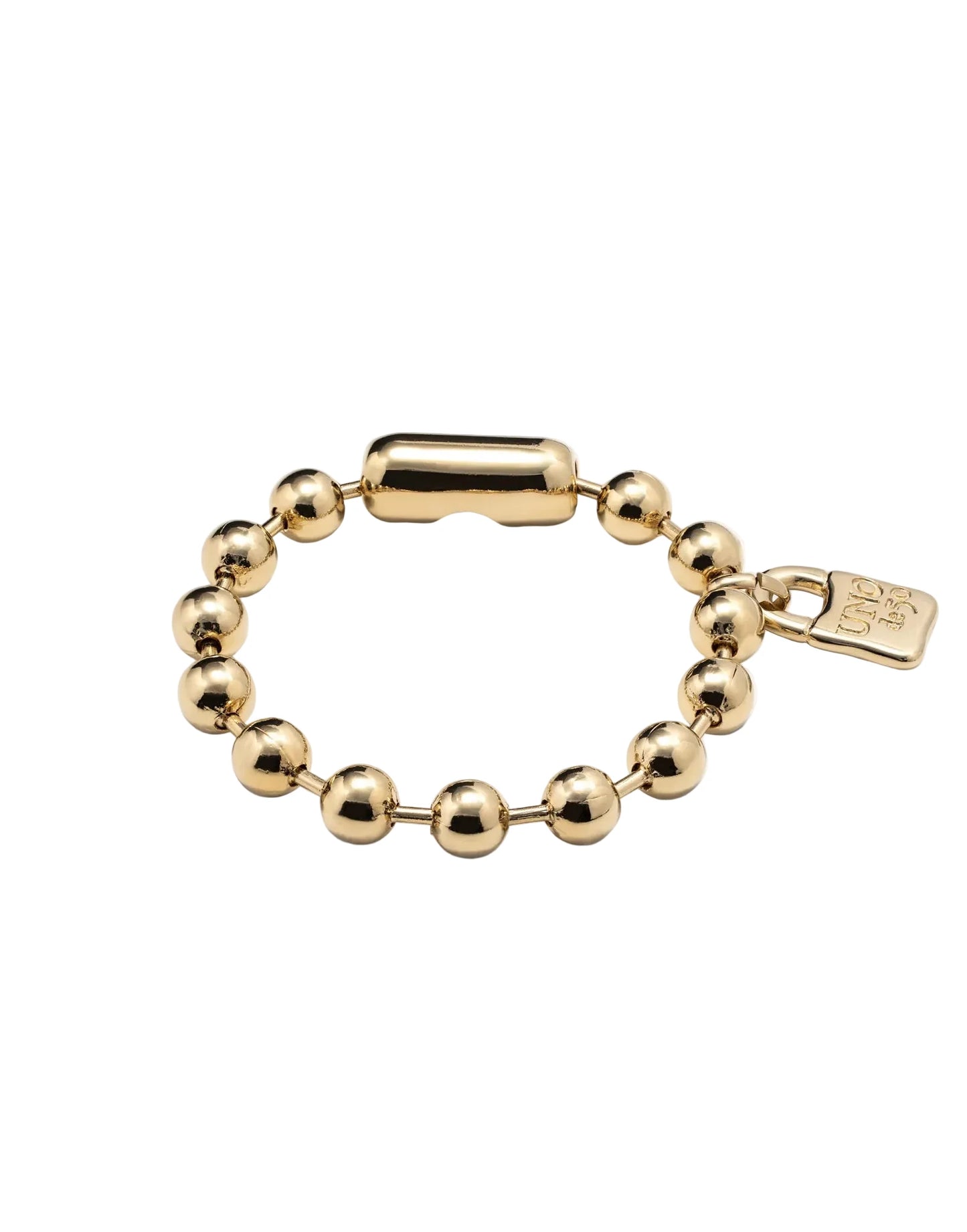 Gold bracelet with a lock clasp on a white background