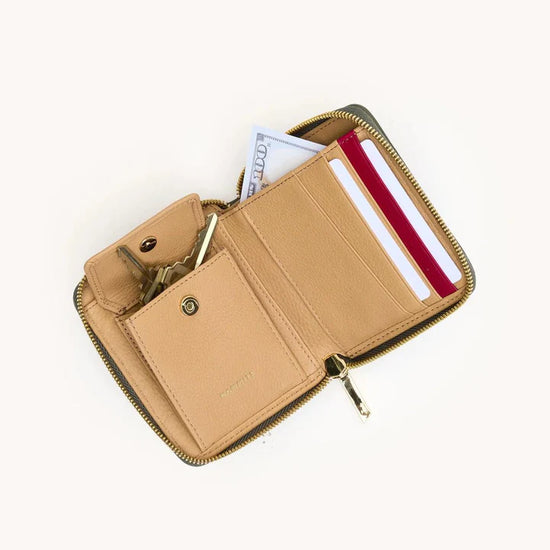 Beige wallet with card slots and key holder on a white background