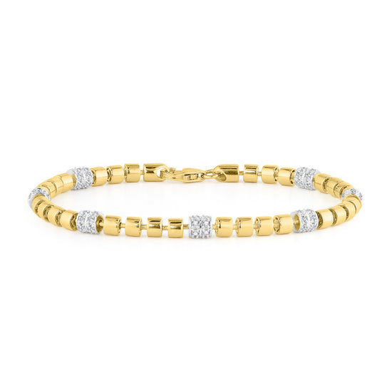 Gold bracelet with embedded diamonds on a white background
