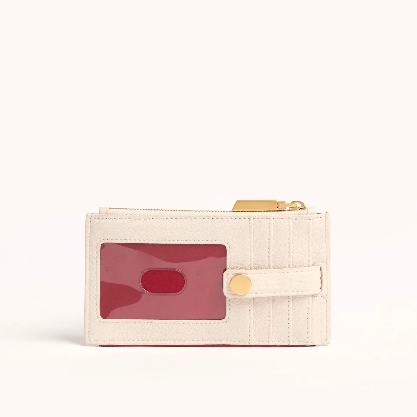 Small cream-colored wallet with a gold clasp on a white background