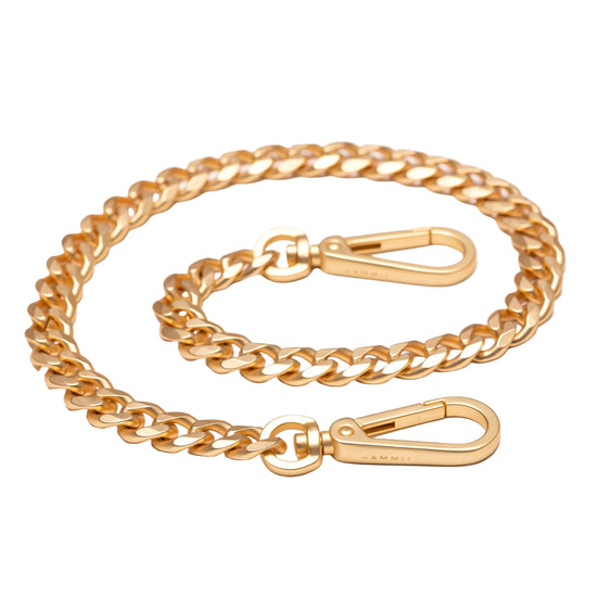 Gold chain with clasp on a white background