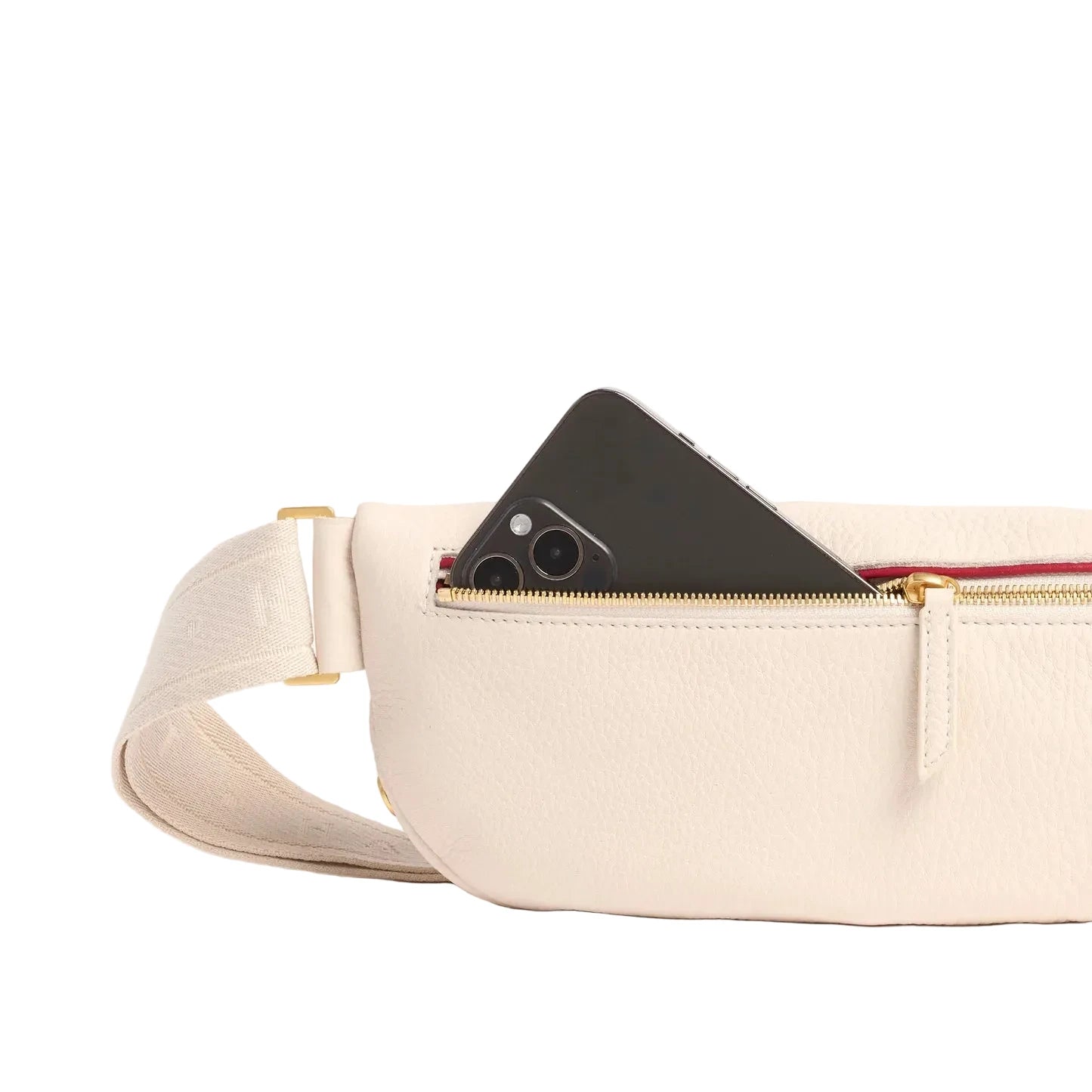 Cream waist bag with a phone peeking out of an outside pocket, on a white background