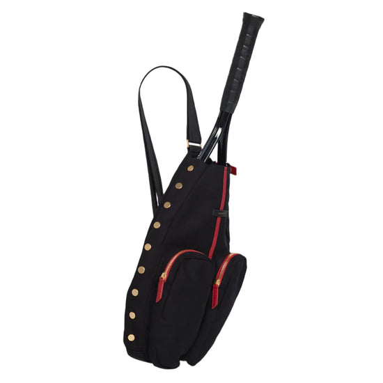 COURTSIDE SLING in Black/ Gold with Red Zip