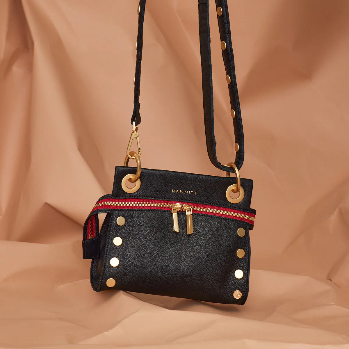 TONY SIGNATURE SML Handbag in Black/Gold with Red Zip