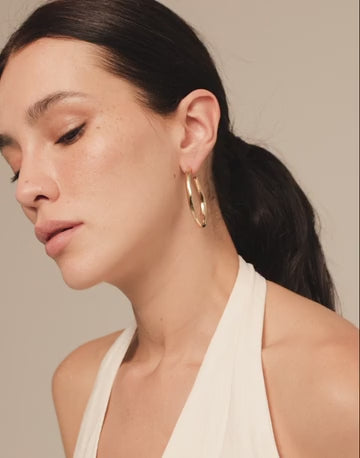 Load and play video in Gallery viewer, OHMMM Hoop Earrings in Gold
